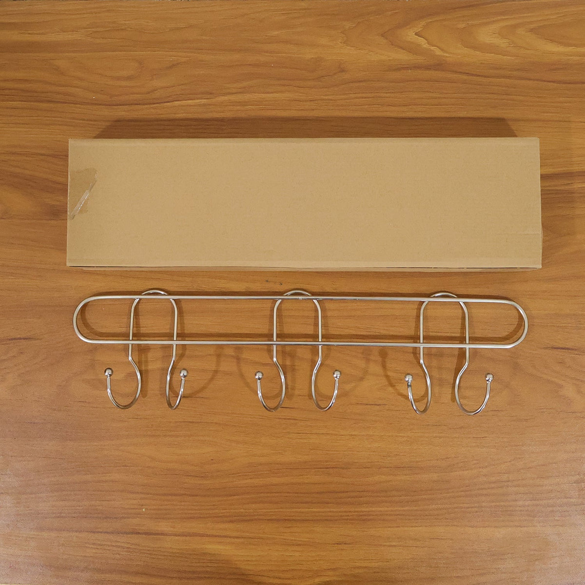 Compact wall mounted hook rack for small spaces
