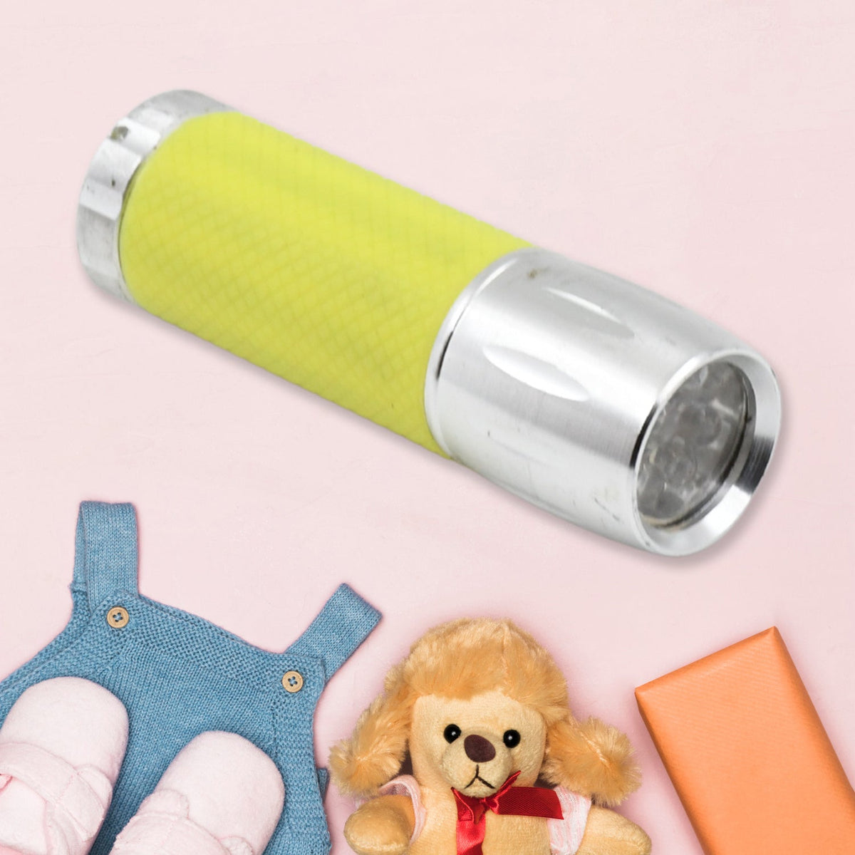 Close-up of the Mini LED Flashlight's powerful beam, cutting through darkness.