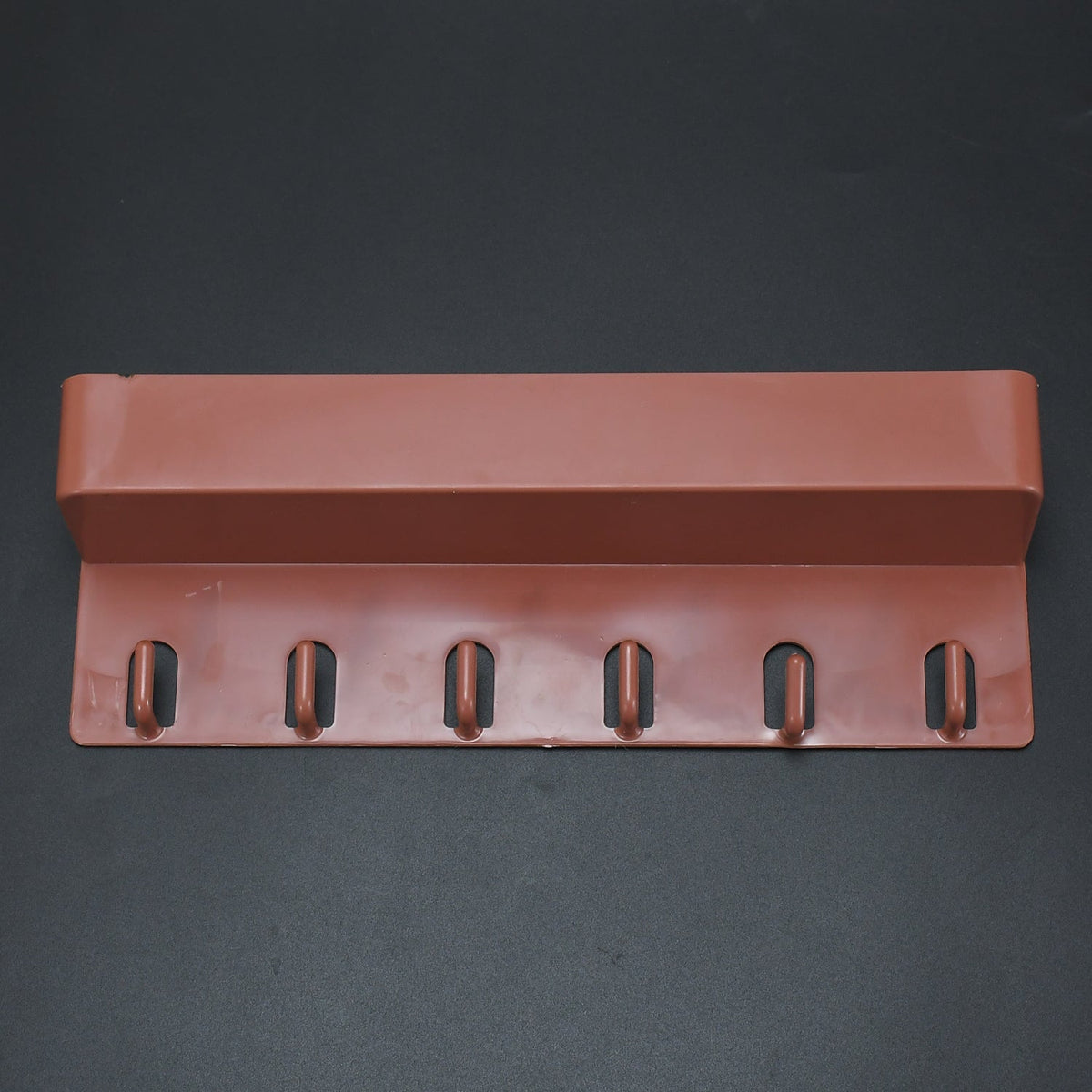Angled view of the multi-use Key Holder Stand displaying its sleek design and ample space for organization.