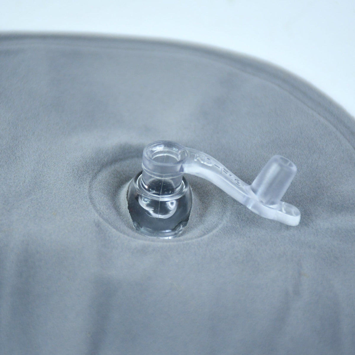 Close-up of features on inflatable travel pillow