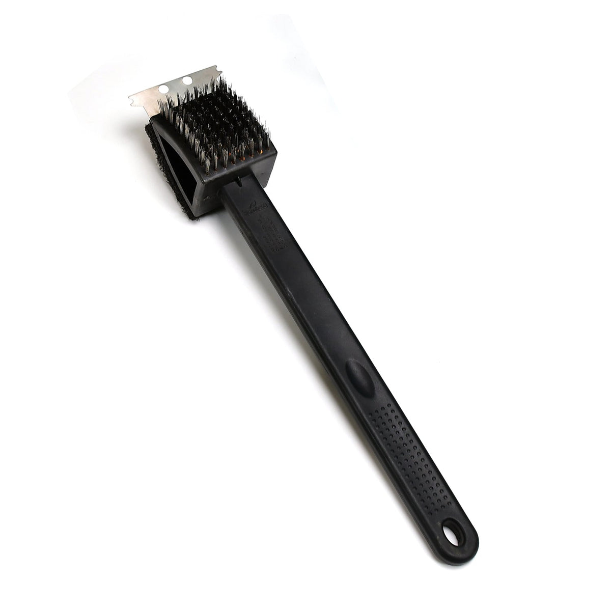 Black silicone toilet brush with its draining holder, ready for use in a modern bathroom.
