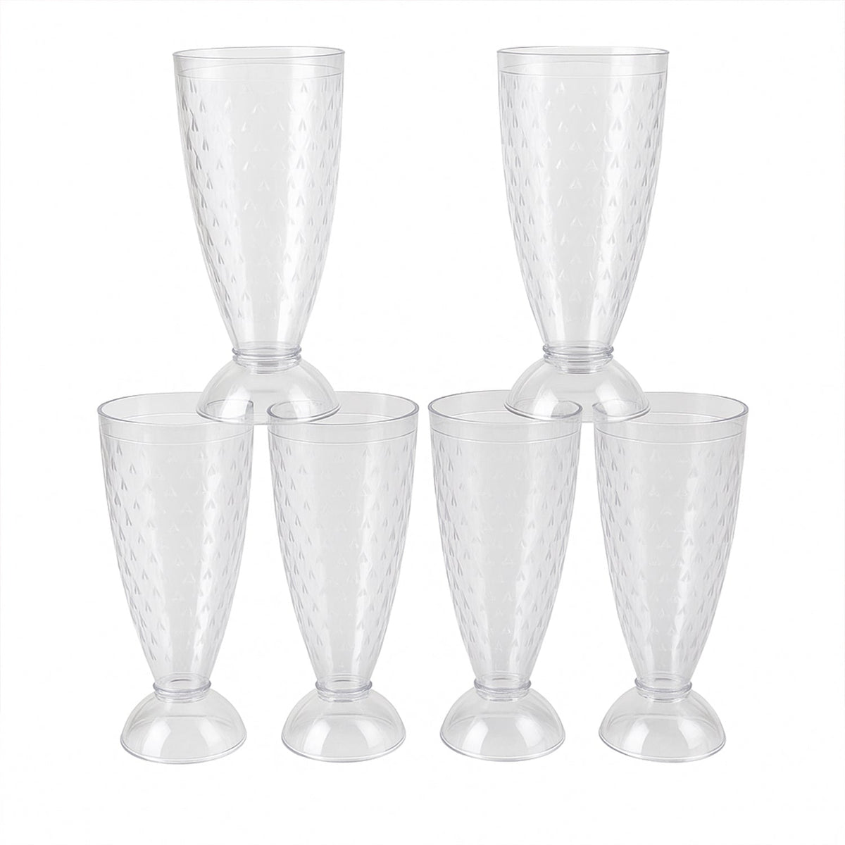 Transparent plastic milkshake glasses neatly arranged on a dining table