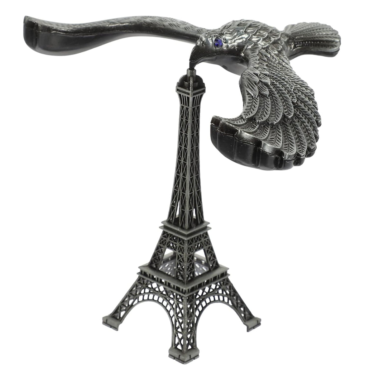 A hand demonstrating the Balancing Eagle Toy's stability by placing it on a fingertip, separate from its stand.