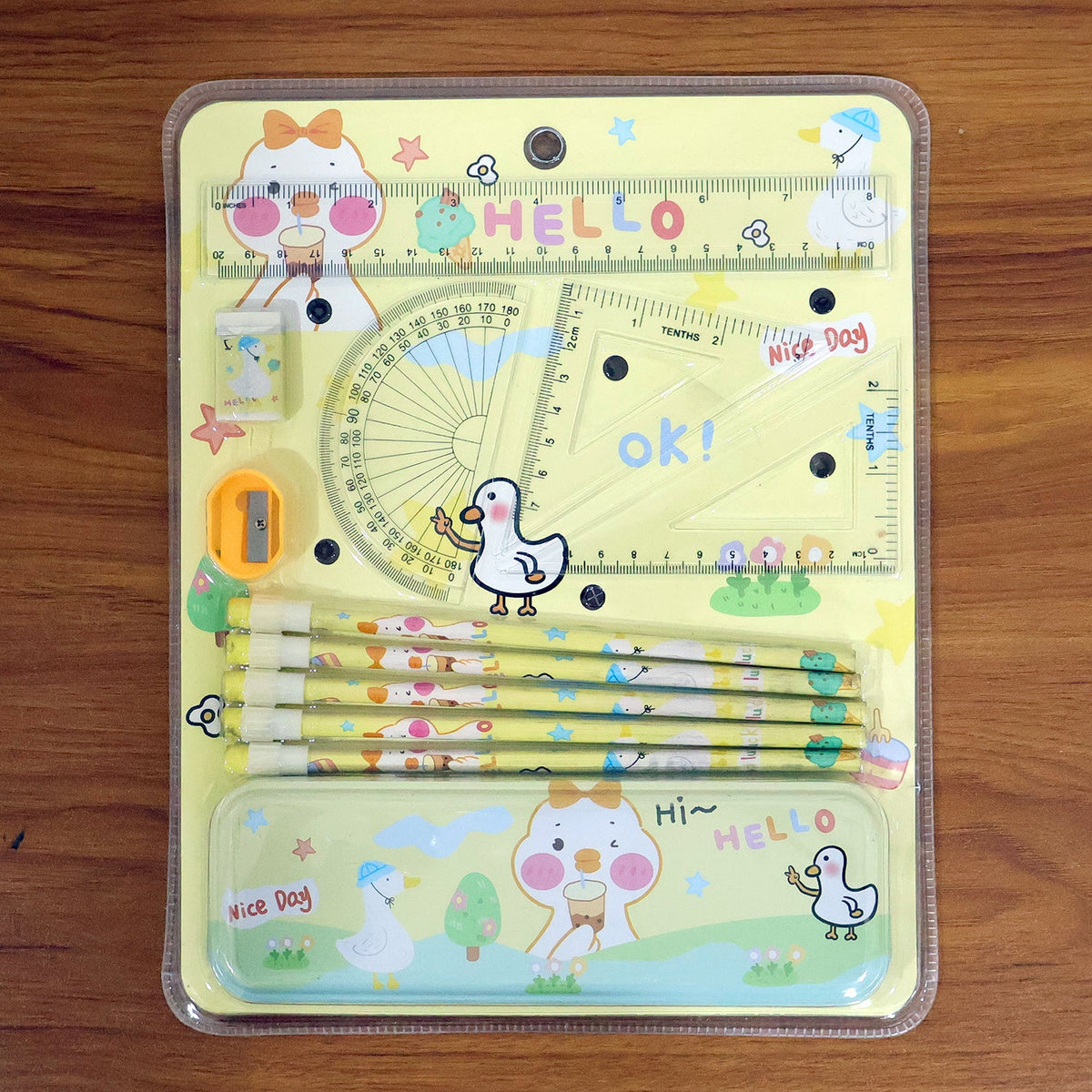 Kids school essentials set with geometry tools in colorful cartoon design