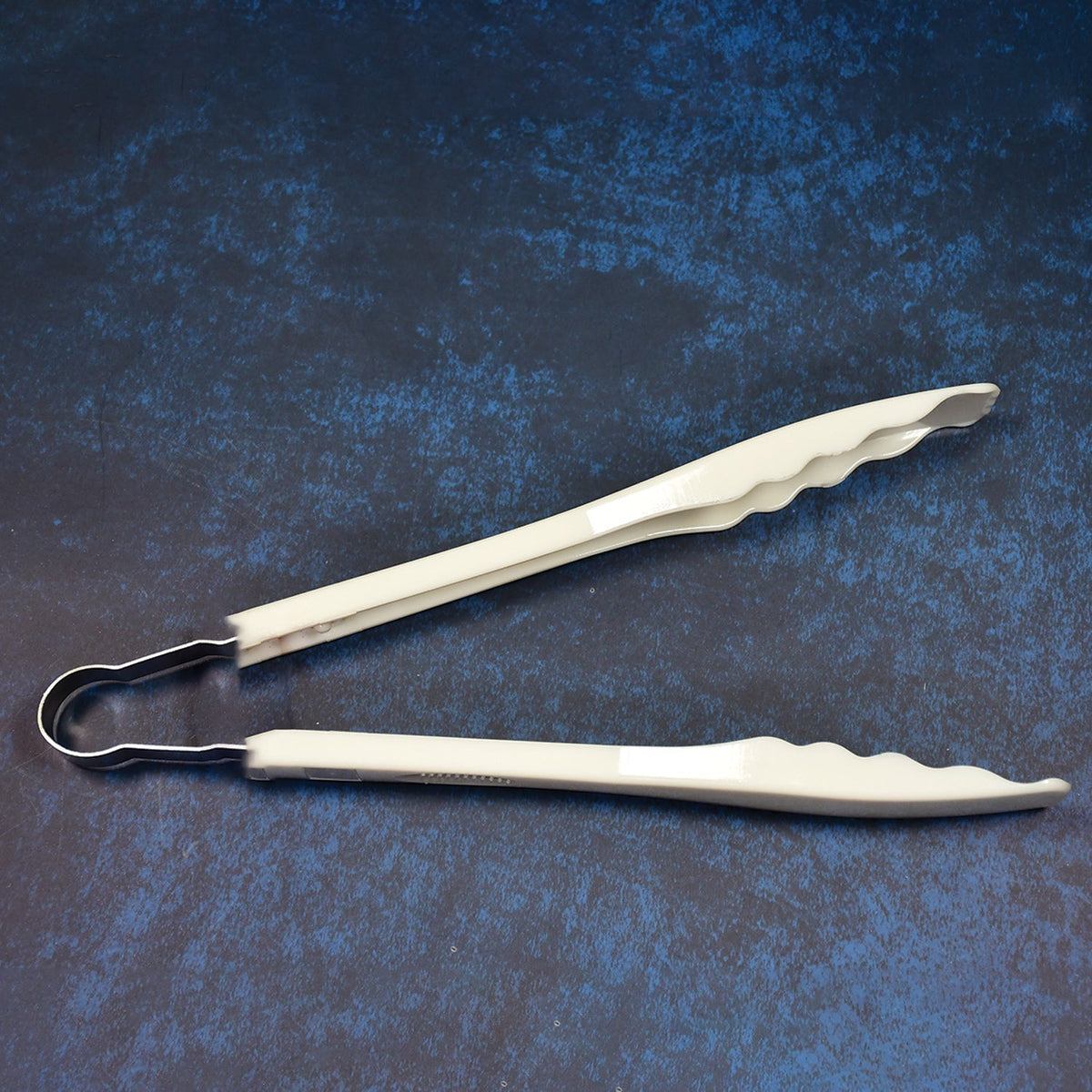 Easy-grip kitchen tongs, perfect for handling food with precision.