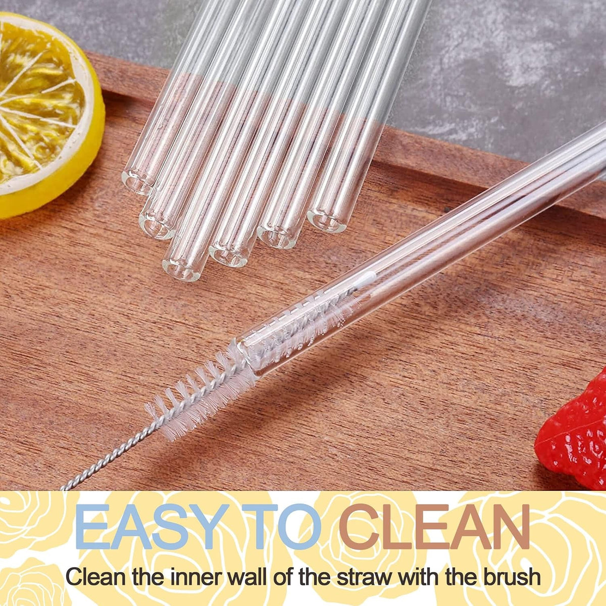 Transparent reusable glass straws arranged on a wooden surface