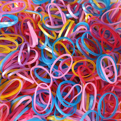 Reusable rubber bands shown stretching, highlighting their flexibility and durability.