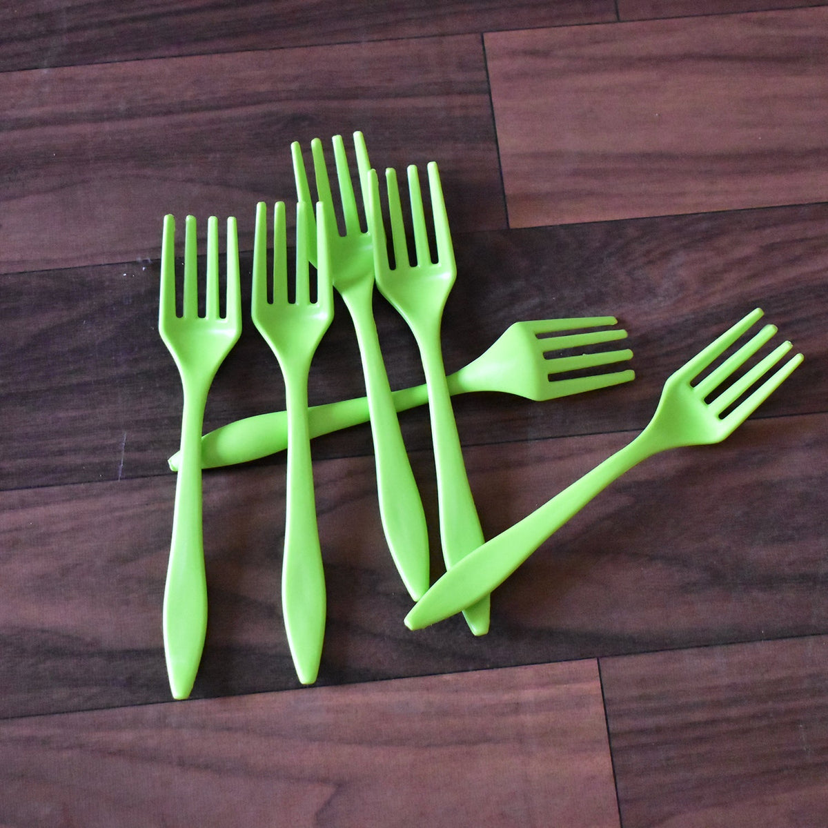 Versatile 6-piece plastic serving fork set, suitable for various foods.