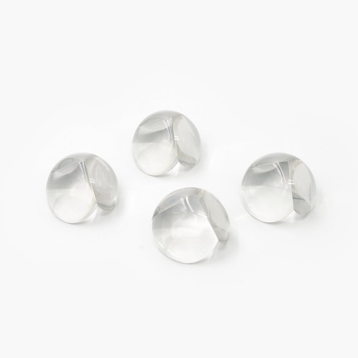 Effective clear corner protectors on a table edge, pack of 4.