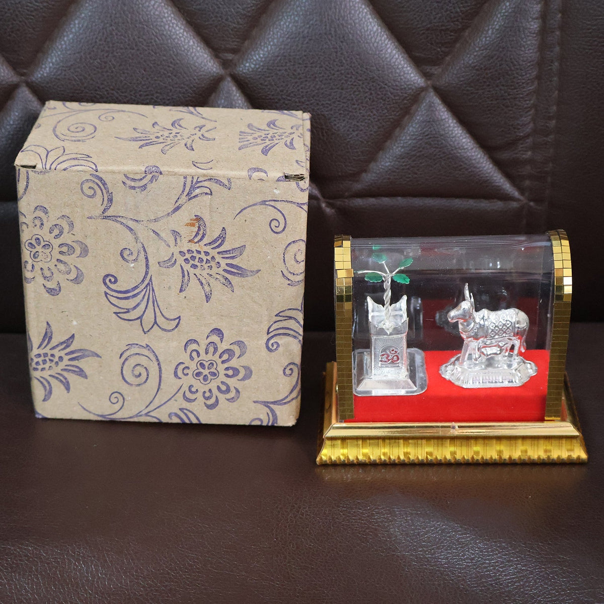 Decorative silver-plated Kamdhenu cow with calf and Tulsi plant idol set